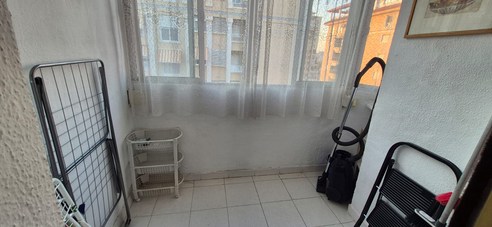 Enclosed veranda with view over the neighbourhood